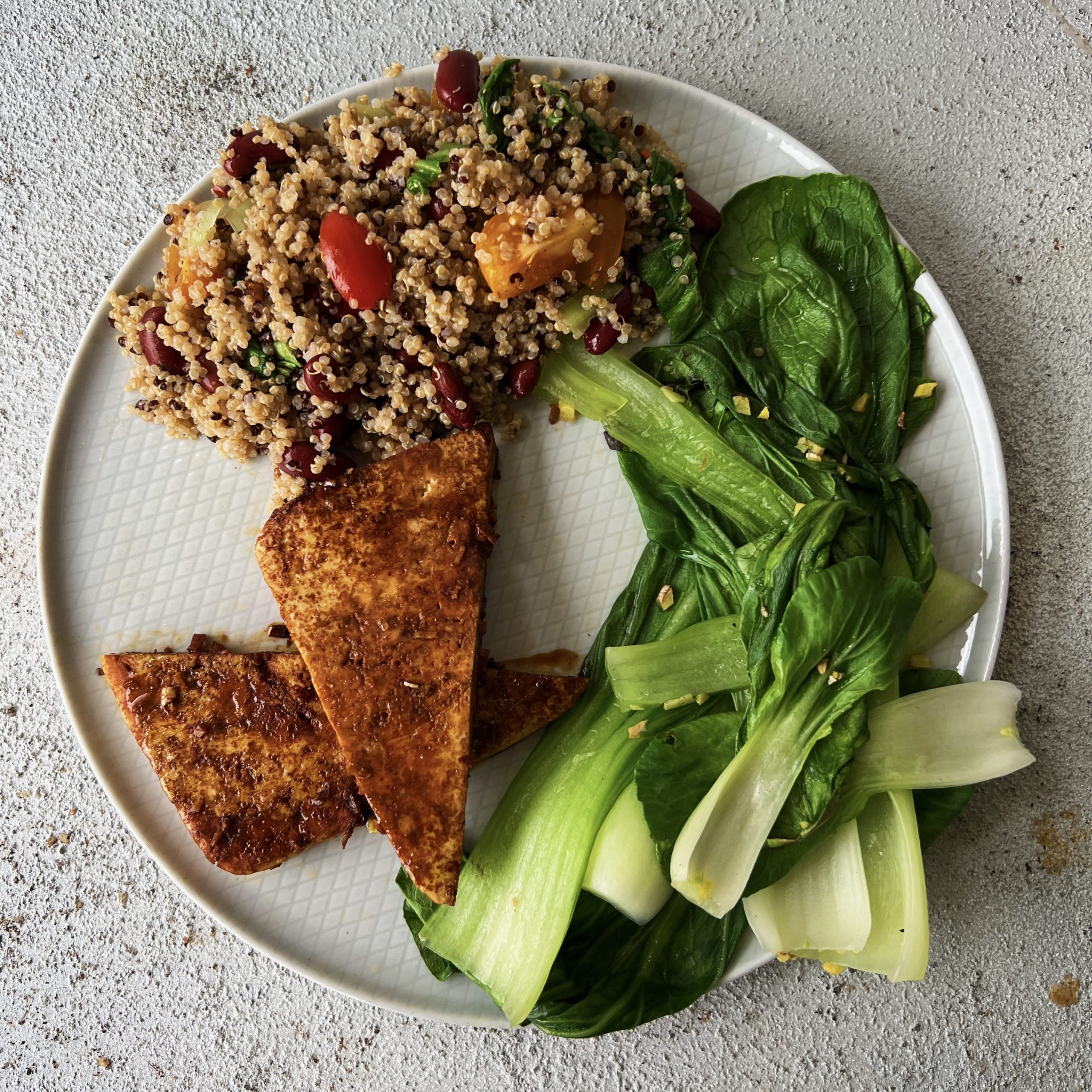 An image of Pan-fried Tofu with Steamed Greens and Quinoa