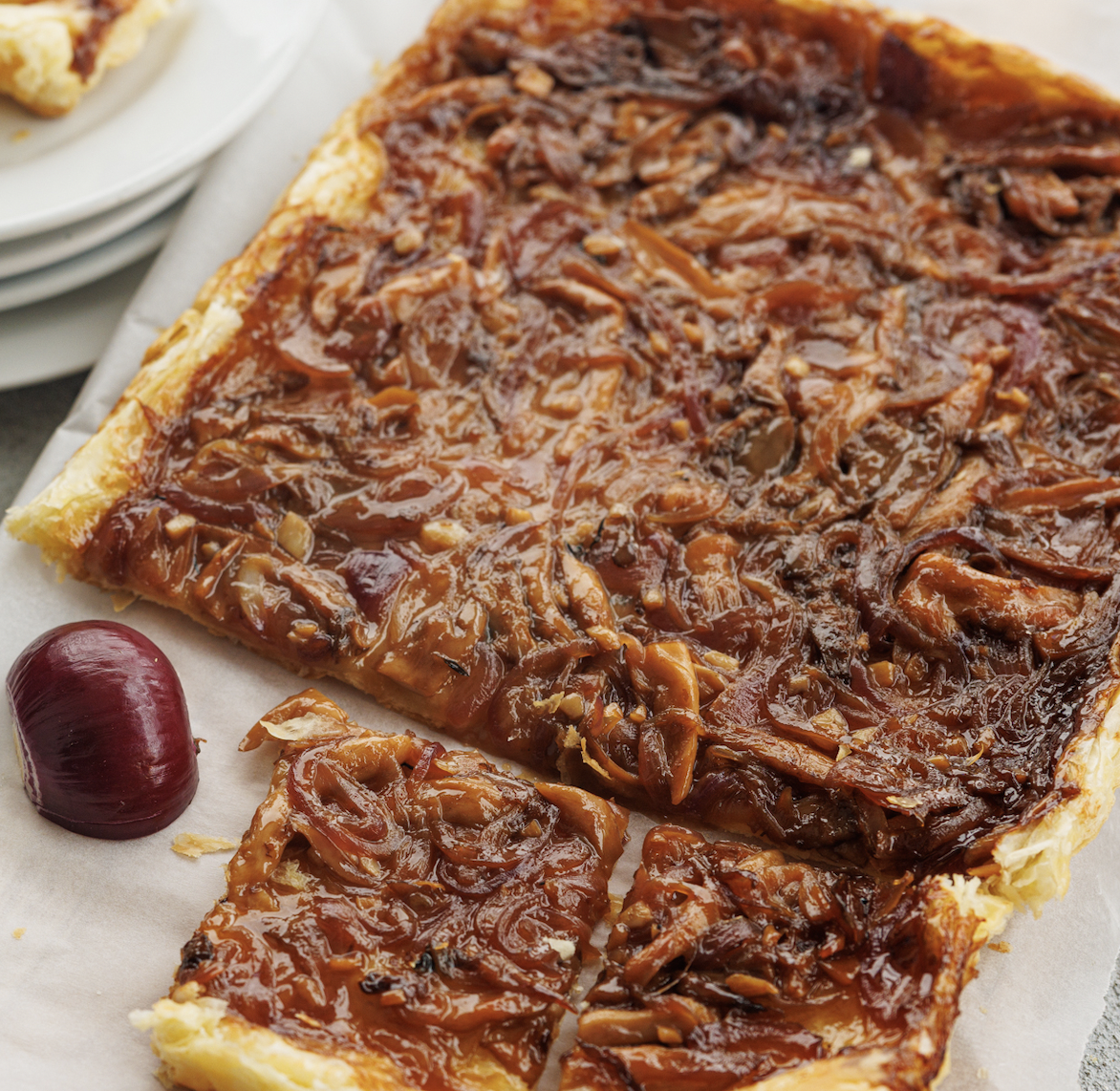 An image of Caramelised red onion and mushrooms Tarte Tatin